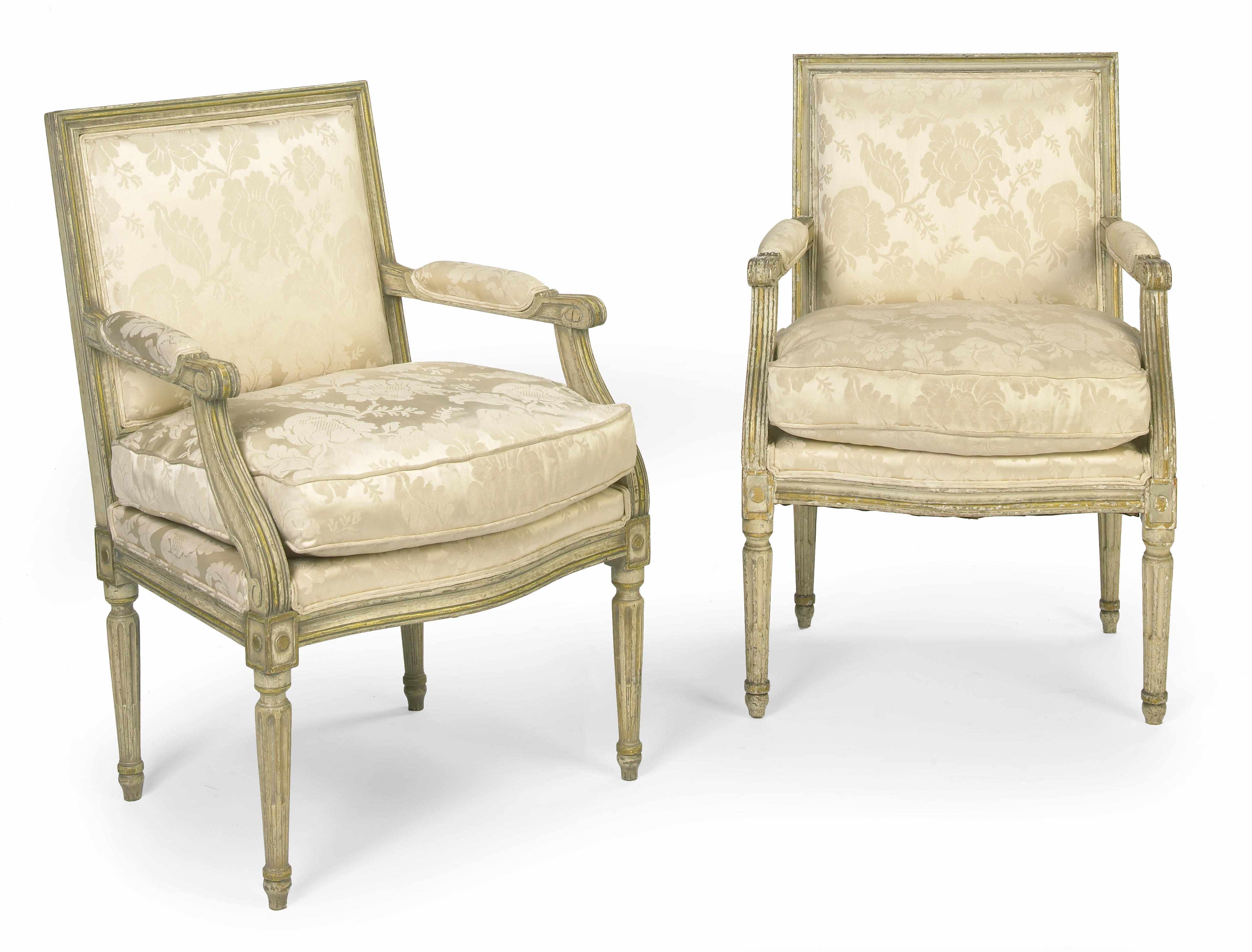 Appraisal: A pair of Louis XVI style paint decorated fauteuils late