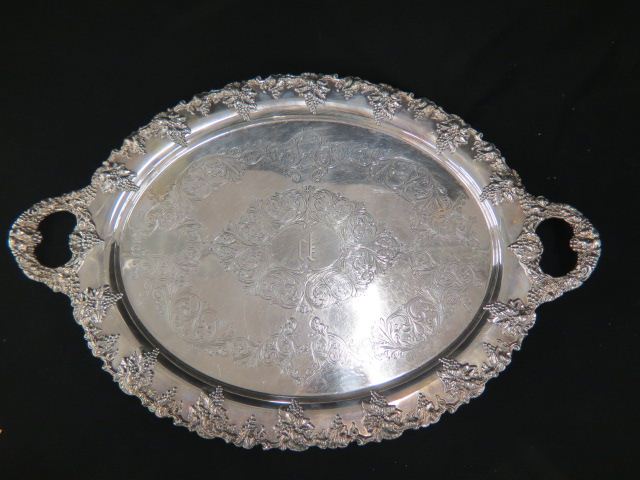 Appraisal: Silverplate Serving Tray grape vine border footed x plus handles