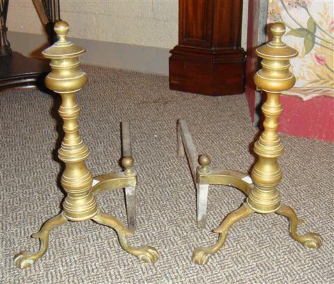 Appraisal: PAIR OF CHIPPENDALE BRASS ANDIRONS AND TRIVET Provenance ANTIQUE CONTEMPORARY