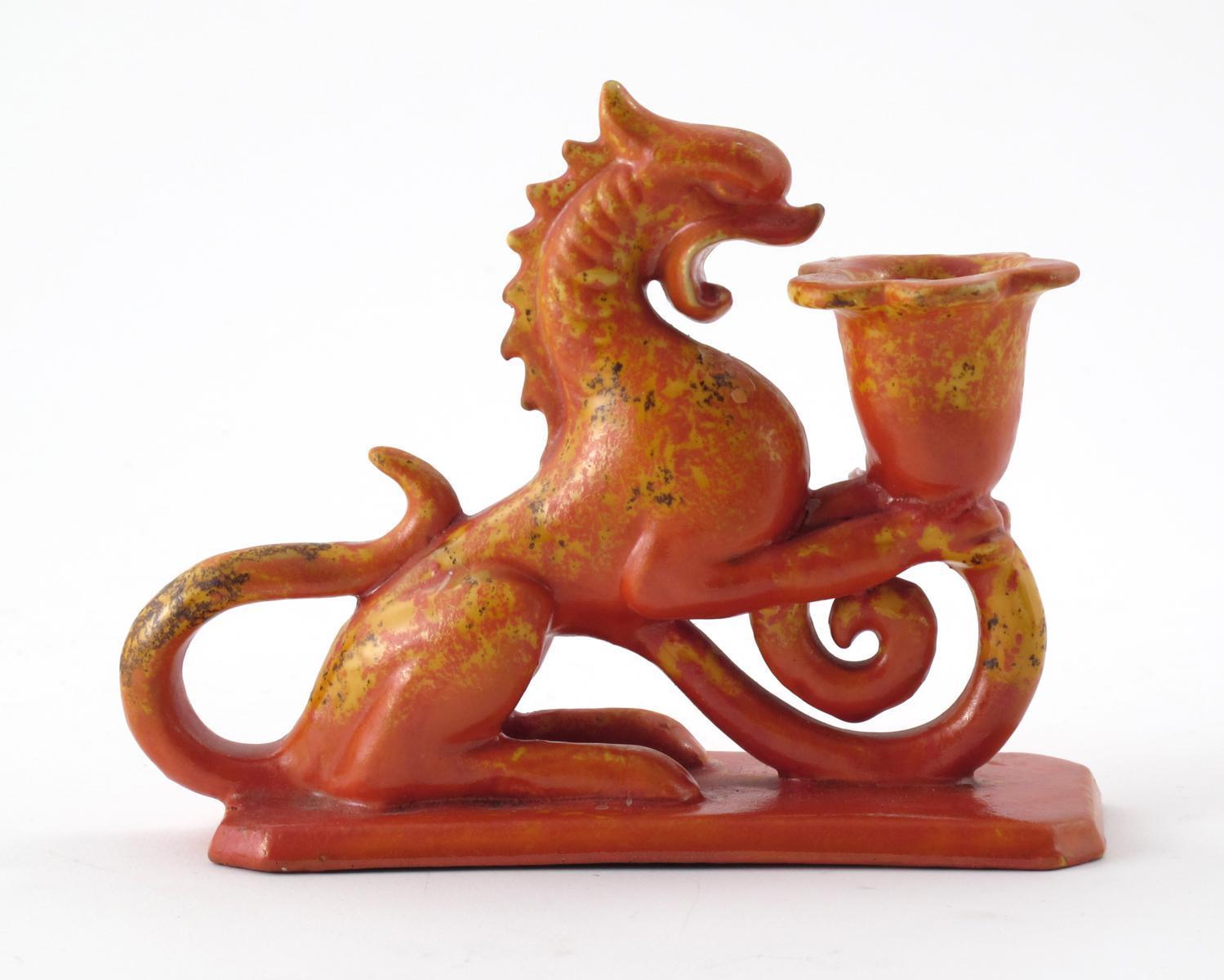 Appraisal: A C H Brannam Barnstaple terracotta chamberstick