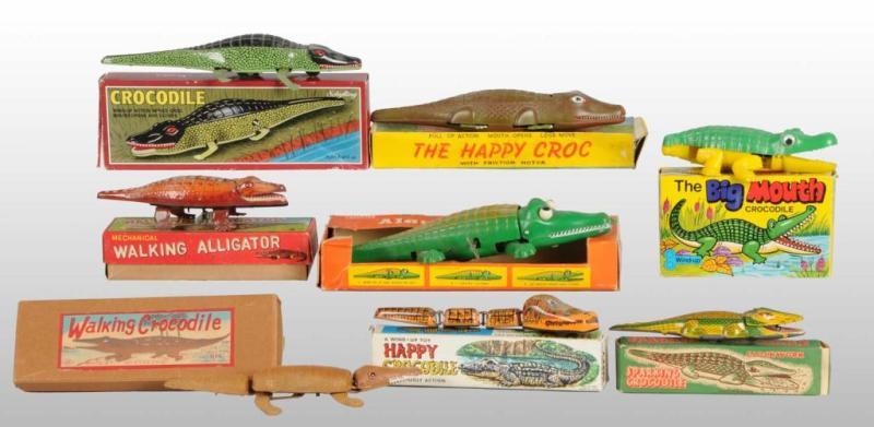 Appraisal: Lot of Alligator Toys Description Includes seven wind-up toys and