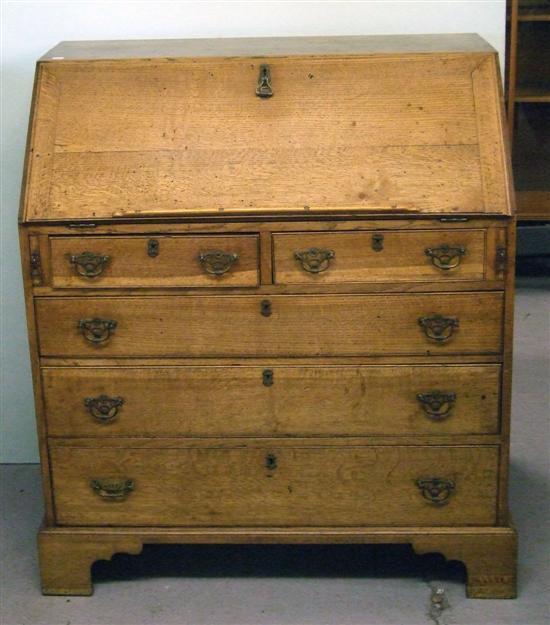 Appraisal: th century oak fall front bureau the interior with drawers