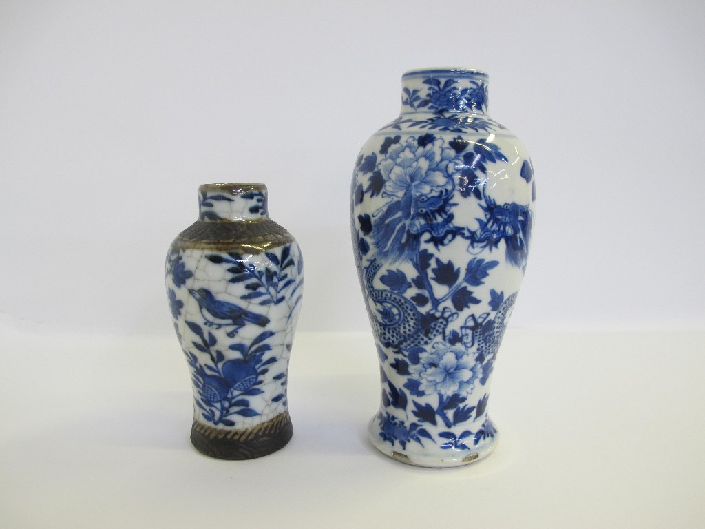 Appraisal: Chinese blue and white vase decorated with two dragons character