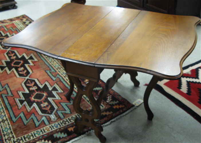 Appraisal: VICTORIAN WALNUT DROP-LEAF PEMBROKE TABLE Rococo Revival American th century