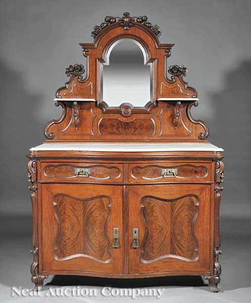 Appraisal: An American Carved Mahogany Sideboard mid- th c arched fruit-carved