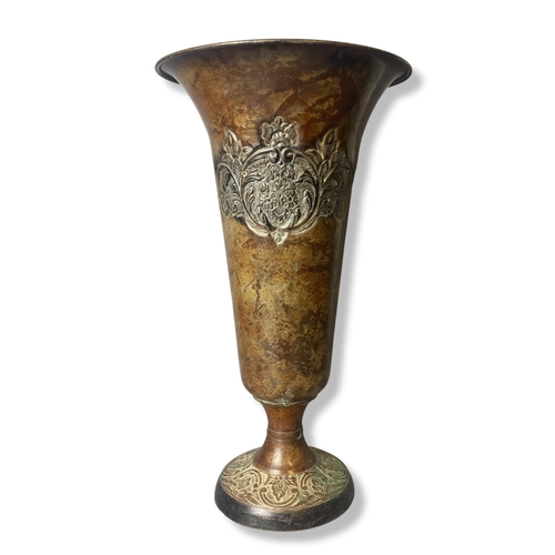 Appraisal: A bronzed metal trumpet vase Stylised design