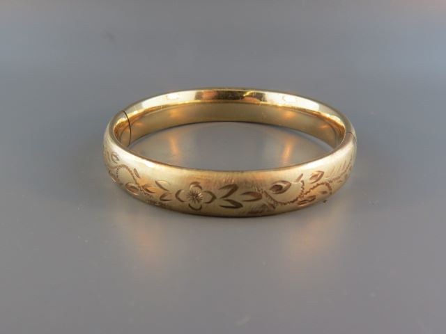 Appraisal: Gold-Filled Bangle Bracelet engraved floral wide across vintage