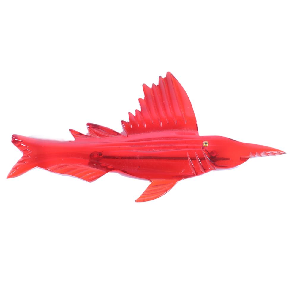 Appraisal: CLEAR RED BAKELITE FISH PIN H X WClear red Bakelite