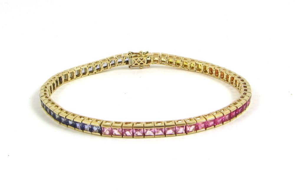 Appraisal: MULTI-COLOR SAPPHIRE AND YELLOW GOLD BRACELET The k yellow gold