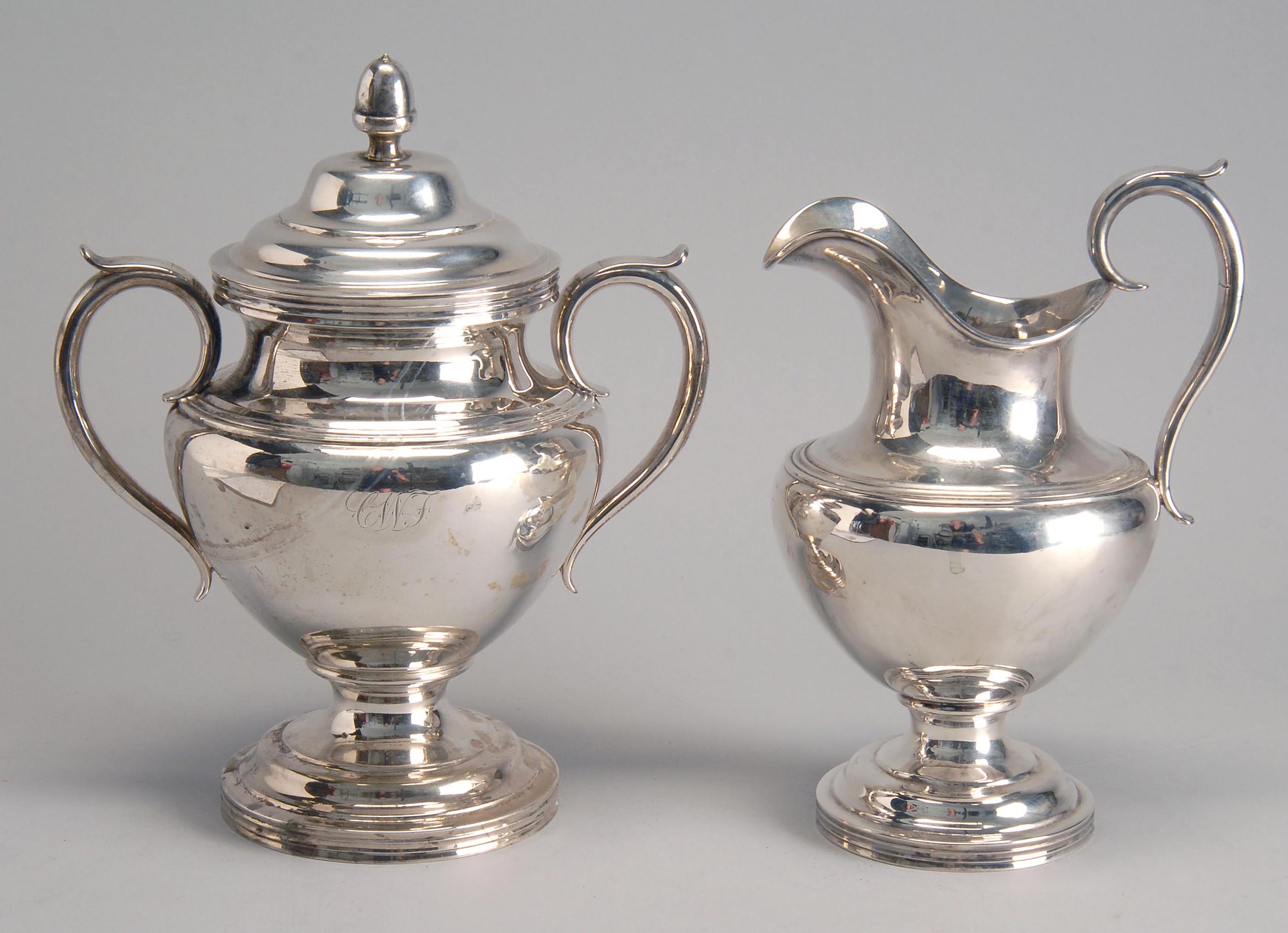 Appraisal: AMERICAN SILVER CREAMER AND COVERED SUGAR BOWL BY BIGELOW BROS