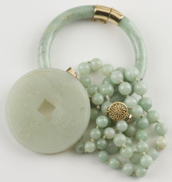 Appraisal: Three Pieces of Jade Jewelry including one disk pendant carved