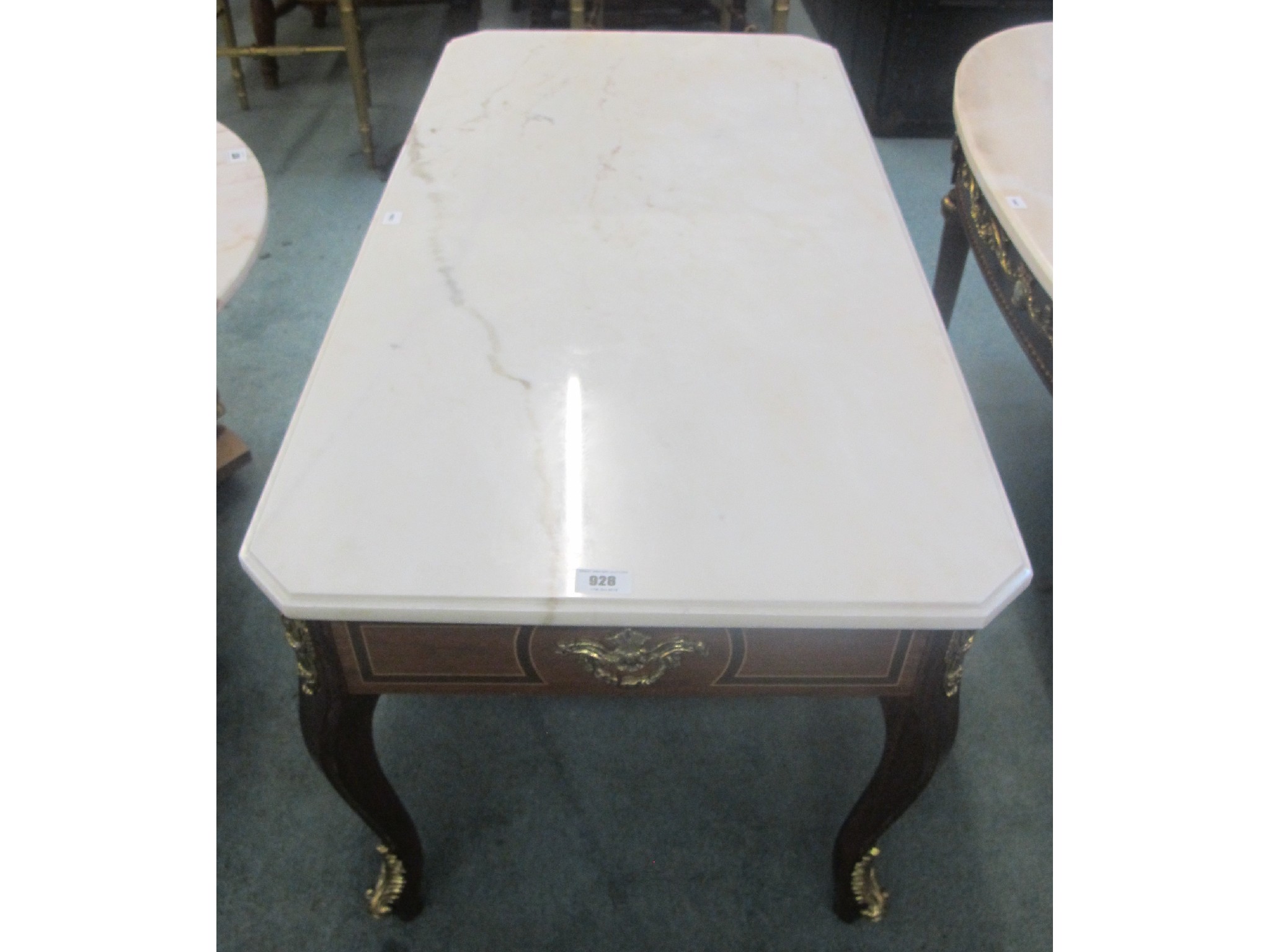 Appraisal: A modern rectangular marble topped coffee table