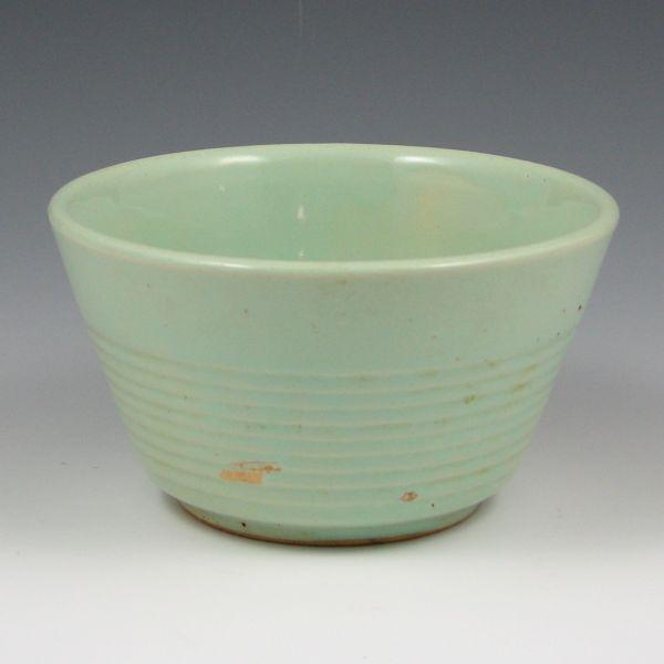 Appraisal: Watt ribbed mixing bowl in unusual light green glaze Marked