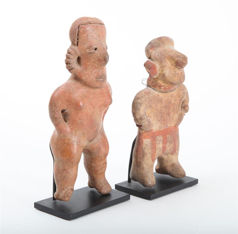 Appraisal: TWO WEST MEXICAN POTTERY FIGURES Modeled as a man and