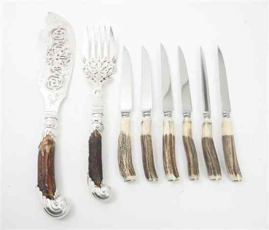 Appraisal: An English Silverplate and Antler Fish Service having a pierced