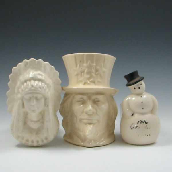 Appraisal: McCoy Indian Wall Pocket Uncle Sam and Snowman Planters wall