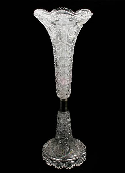 Appraisal: An American brilliant cut glass tall vase with silvered-metal medial