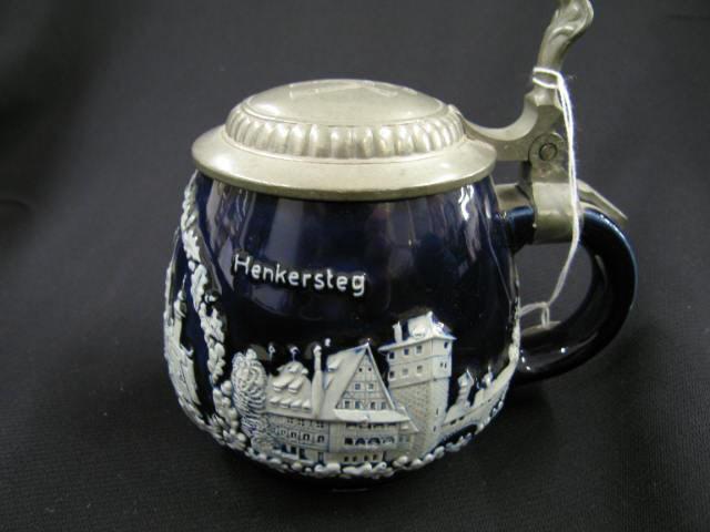 Appraisal: German Pottery Stein Nurnberg cobalt on grey bas-relief scenes pewter