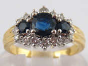 Appraisal: An carat yellow gold diamond and sapphire ring estimated diamond