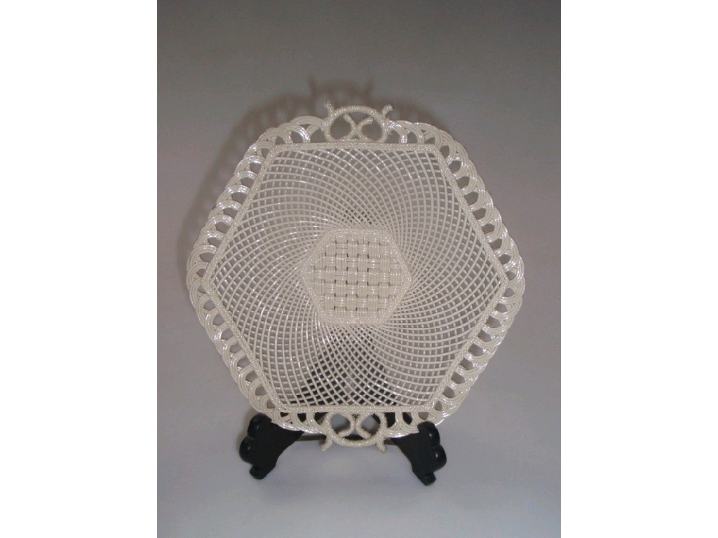 Appraisal: A Belleek lattice dish with simulated coral handles impressed mark