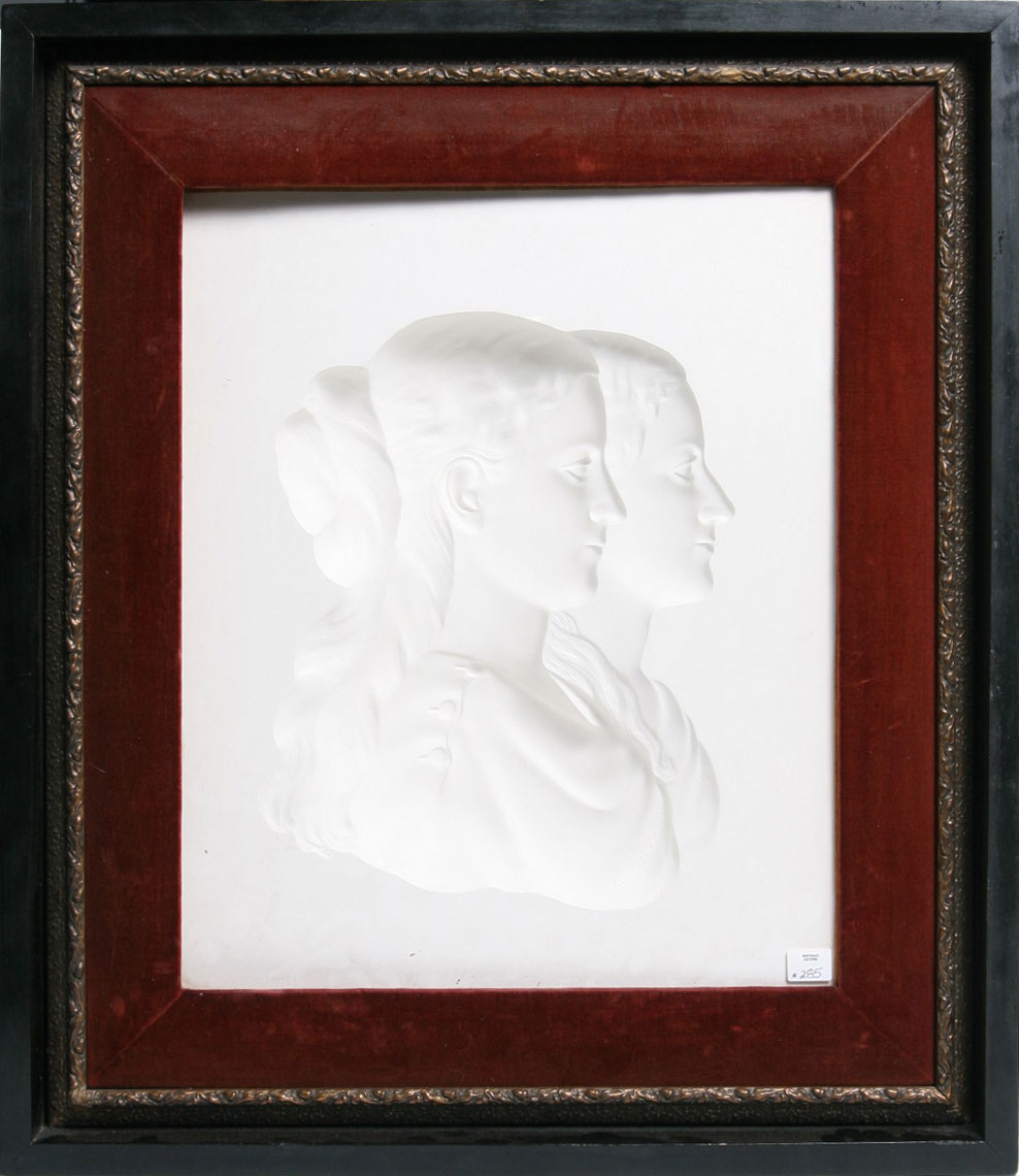 Appraisal: FRAMED WHITE PLASTER INTAGLIO PORTRAIT OF A YOUNG MAN AND