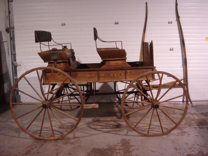 Appraisal: seat spring wagon mfg by The Gregg Carriage Company Arch