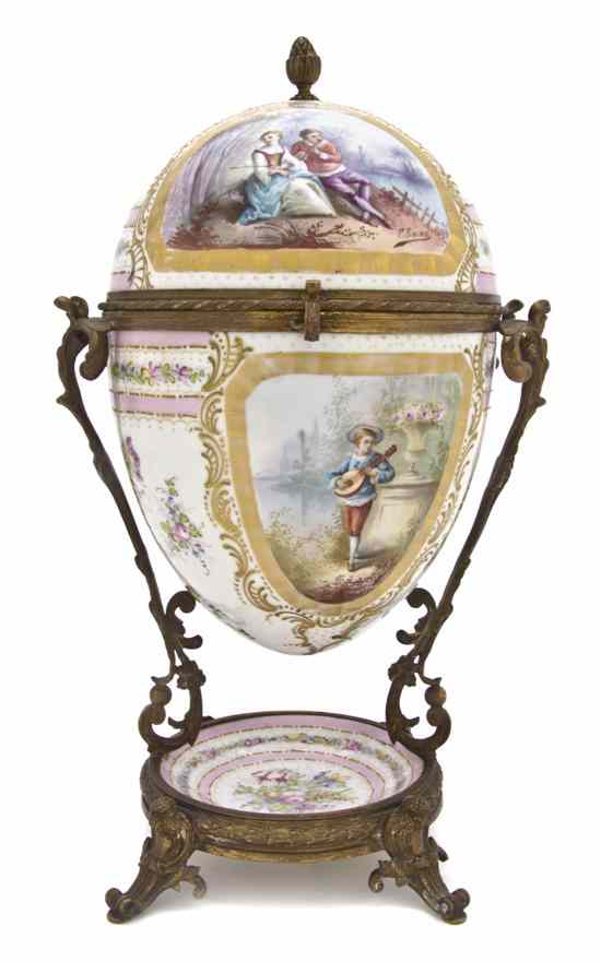 Appraisal: A French Porcelain and Gilt Metal Mounted Box of ovoid