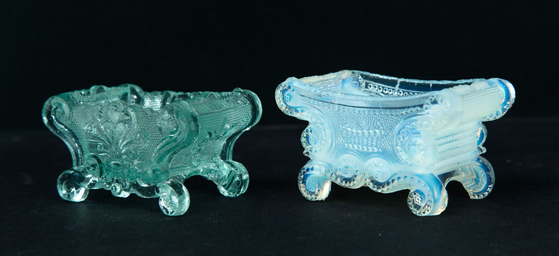 Appraisal: TWO LACY GLASS SALTS American nd quarter- th century Opalescent