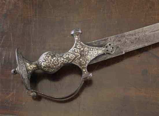 Appraisal: A th century Indian talwar with inch blade and silver