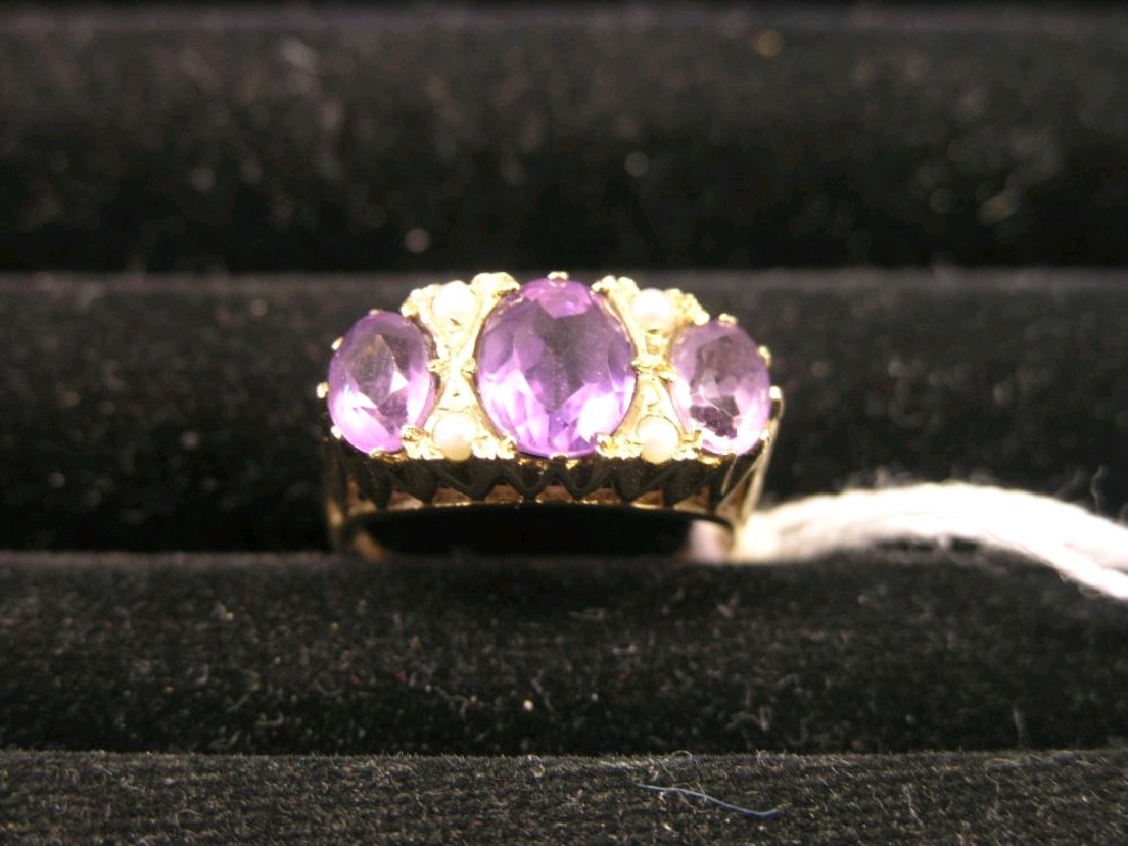 Appraisal: A ct gold and amethyst half-hoop ring three amethysts and