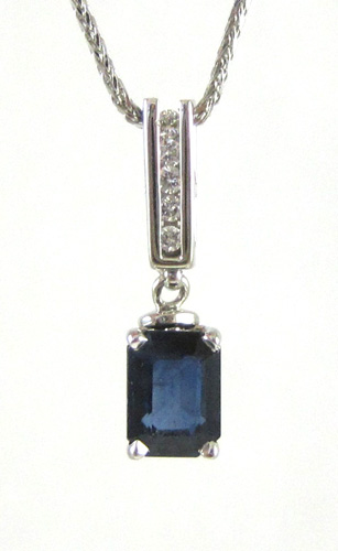 Appraisal: SAPPHIRE AND DIAMOND PENDANT NECKLACE suspended on an inch k