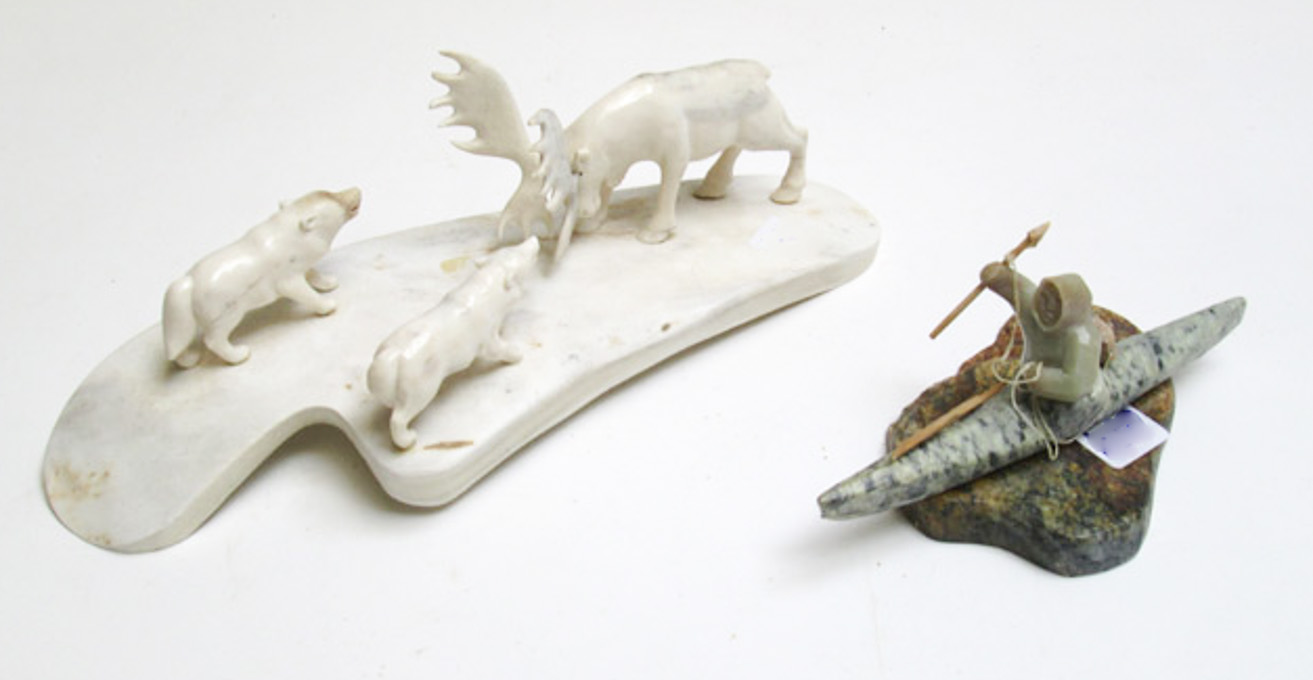 Appraisal: NATIVE ALASKAN CARVED BONE AND STONE SCULPTURES the bone sculpture