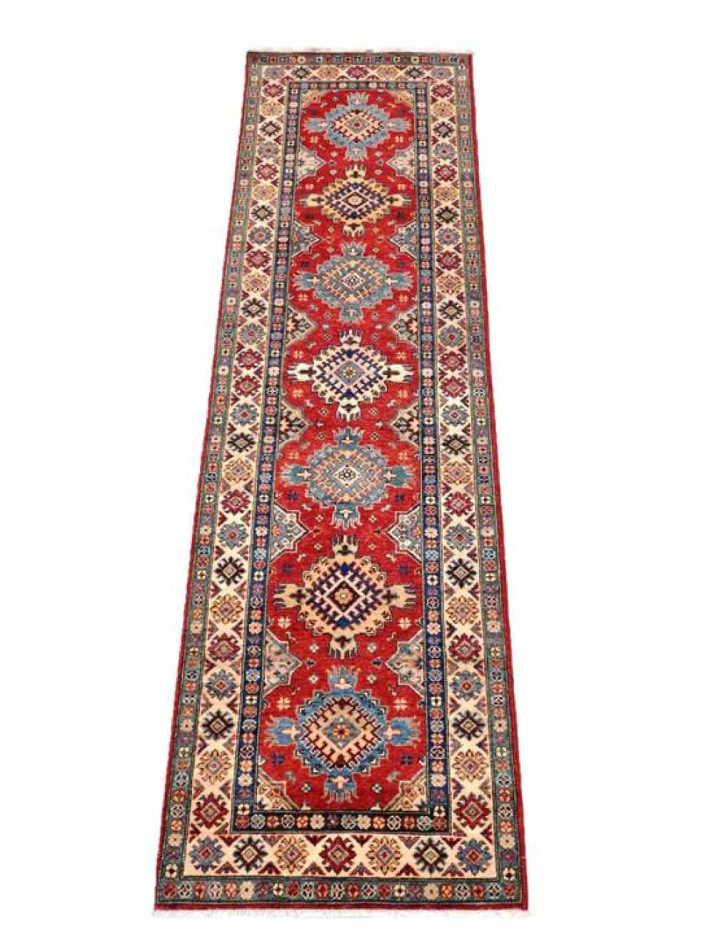 Appraisal: RUG Uzbek Kazak runner ' x ' red field cream