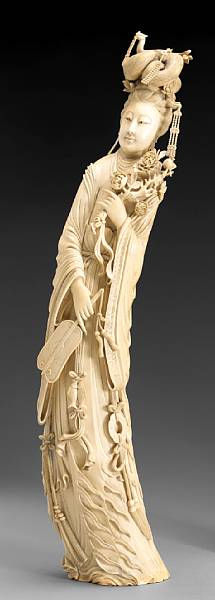 Appraisal: A large carved ivory figure of a beauty th Century