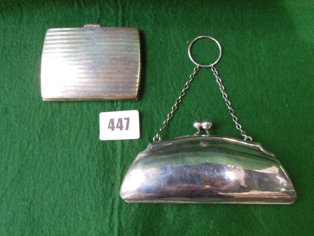 Appraisal: A silver purse with leather lining Birmingham by Frank H