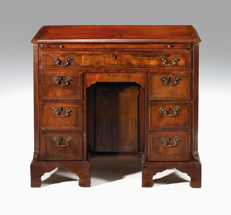 Appraisal: George lll walnut and mahogany kneehole desk The rectangular top