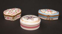 Appraisal: A Trio of Hand-Painted Porcelain Pill Boxes This trio of