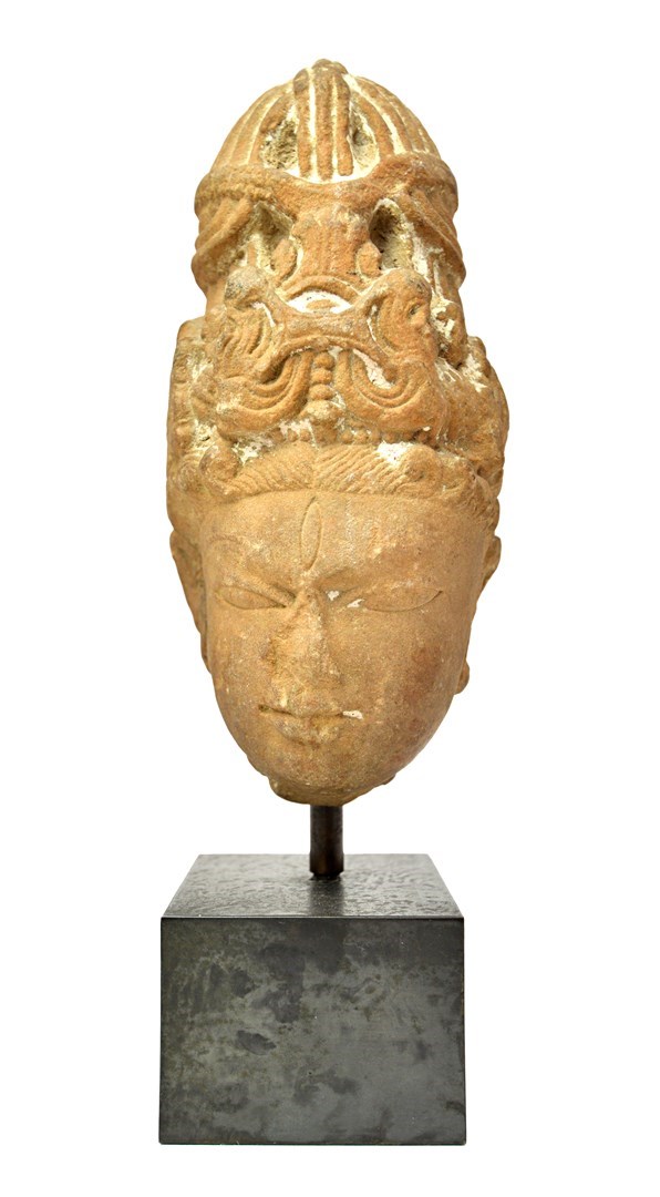 Appraisal: A sandstone head of a deity Central India circa th