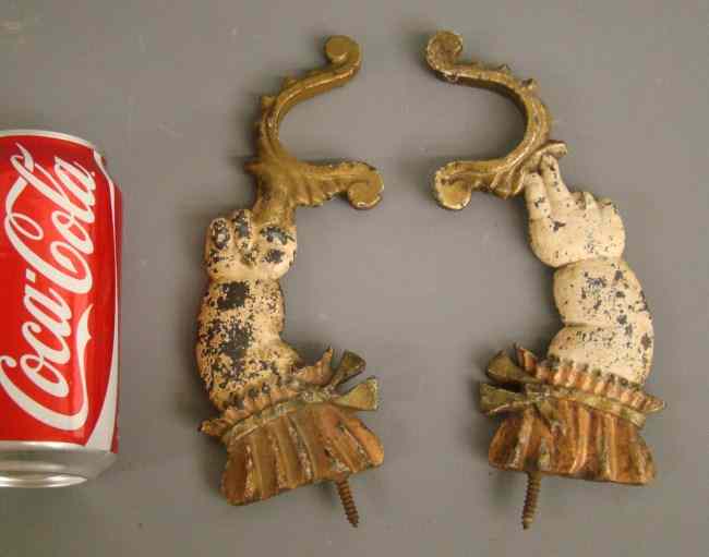 Appraisal: Pair early cast iron polychrome painted hand form hooks ''