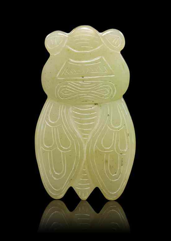 Appraisal: A Chinese White Nephrite Jade Cicada the cicada having incised