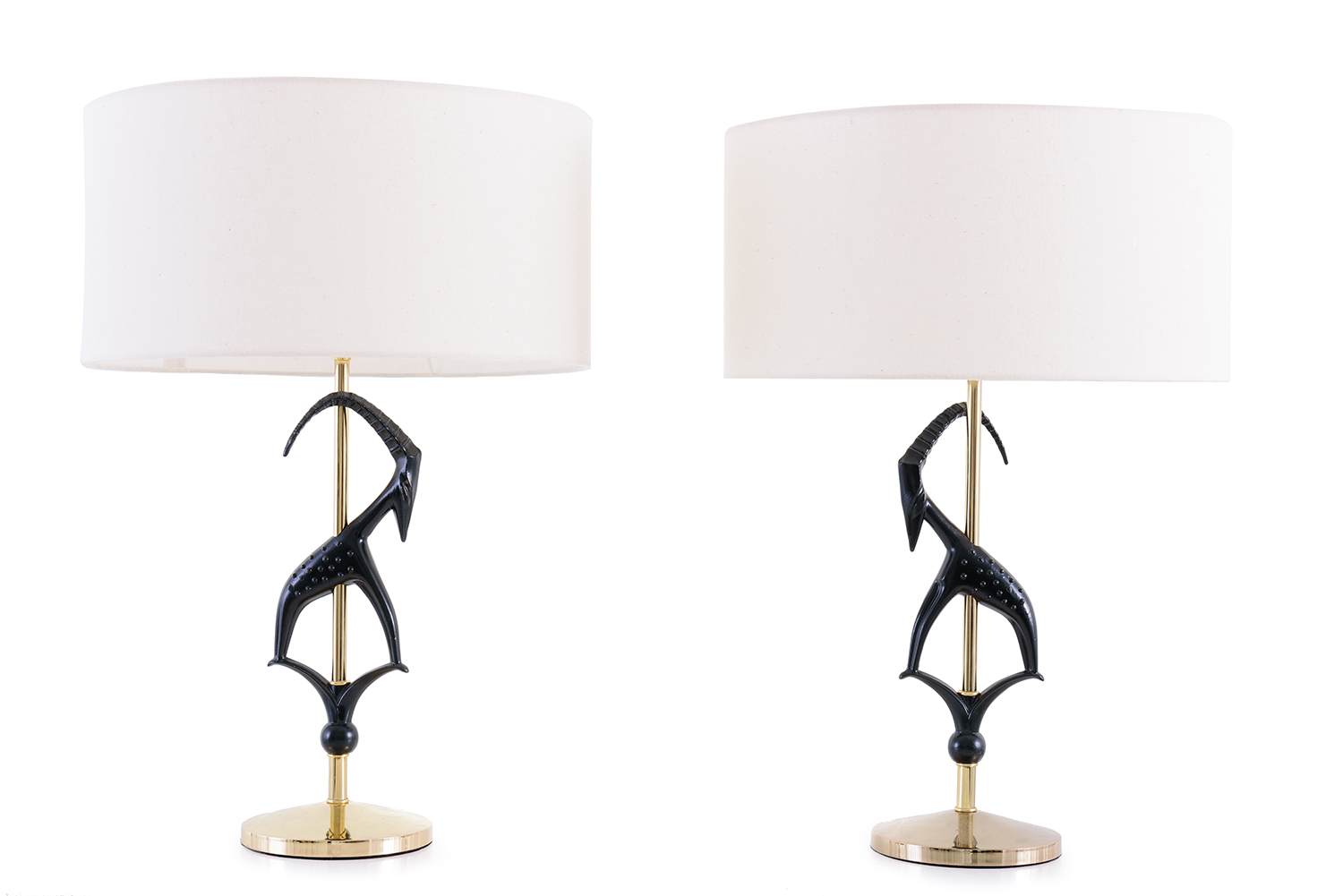 Appraisal: PAIR OF MID CENTURY GAZELLE LAMPS Brand new bespoke shades