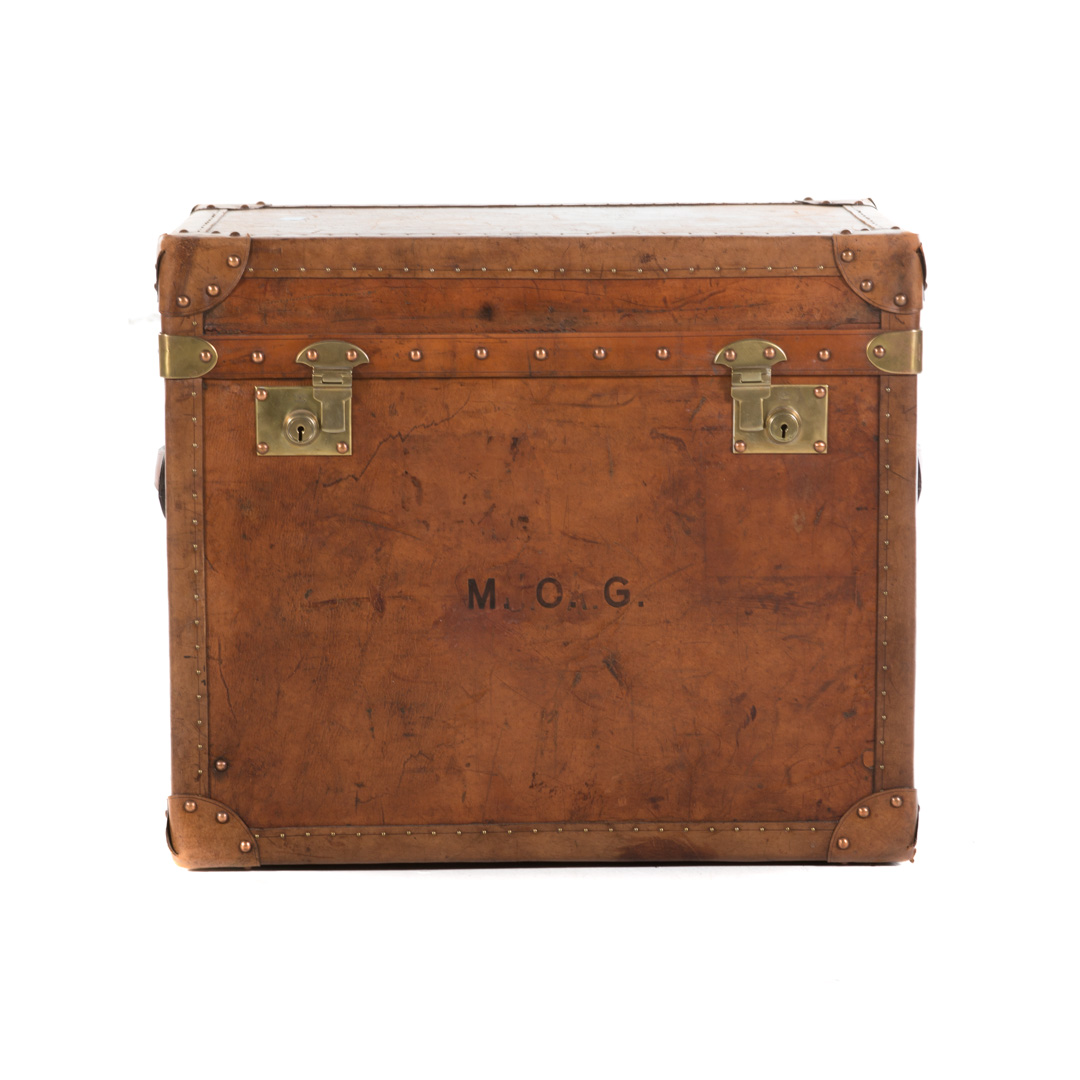 Appraisal: Brown leather brass-bound steamer trunk th century storage compartment enclosed