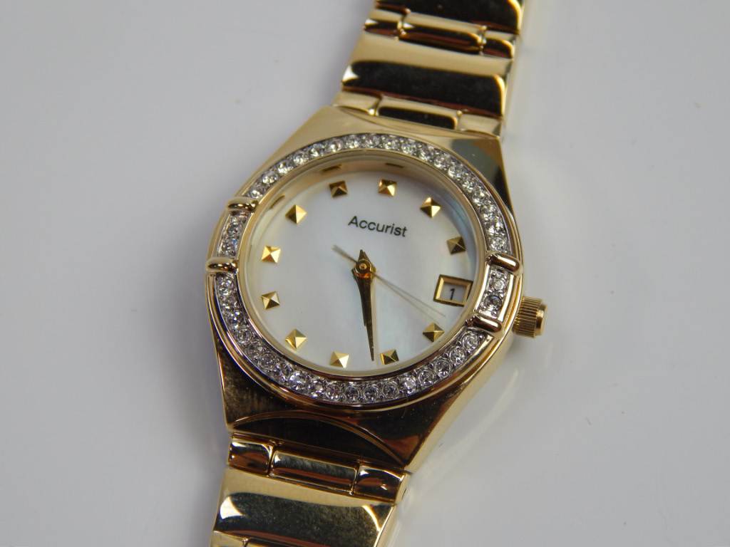 Appraisal: An Accurist ladies wristwatch gold plated with mother of pearl