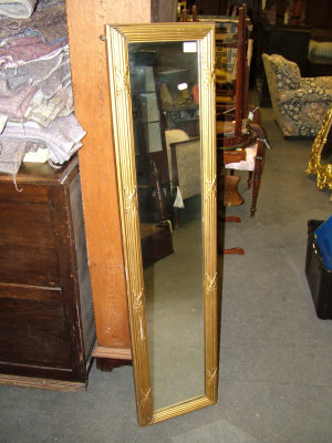 Appraisal: A giltwood wall mirror th century of rectangular form with