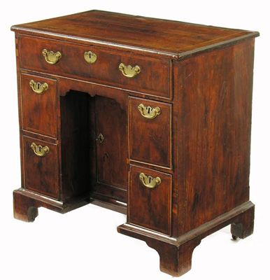 Appraisal: A George II yew wood kneehole secretaire desk with boxwood