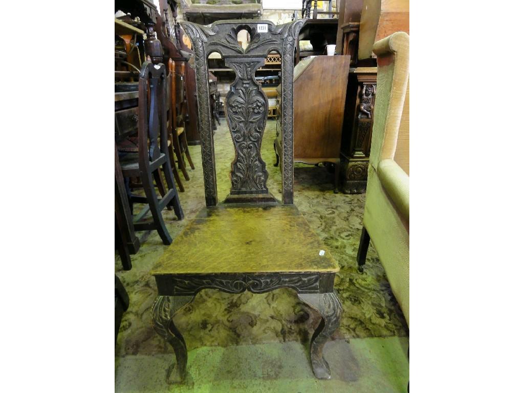 Appraisal: A Victorian oak single chair the raised back with carved