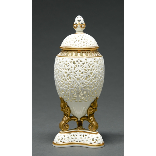 Appraisal: A Grainger's Worcester reticulated vase and cover c on three