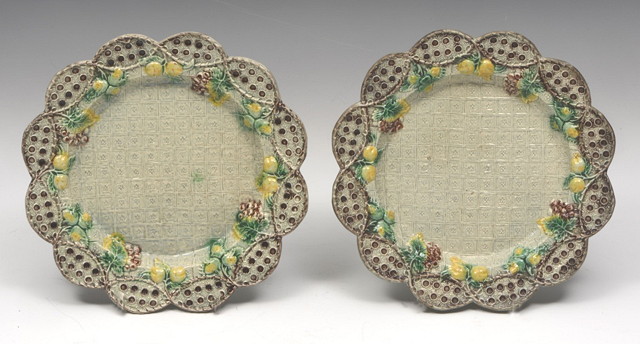 Appraisal: A PAIR OF STAFFORDSHIRE WHIELDON MOULDED POTTERY PLATES decorated trailing