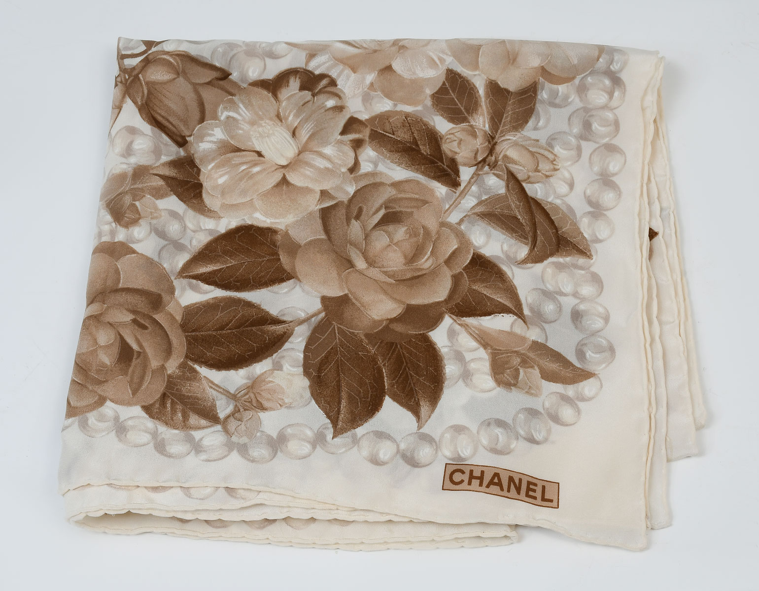 Appraisal: CHANEL SILK CAMELLIA SCARF IN BROWN TONES These soft brown