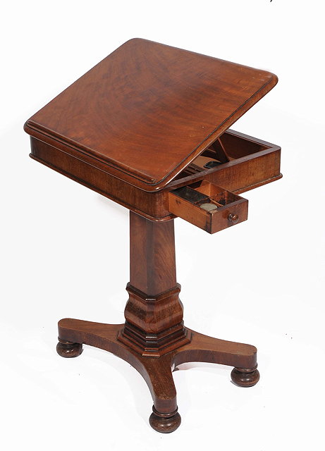 Appraisal: A VICTORIAN MAHOGANY READING TABLE with lifting top square column